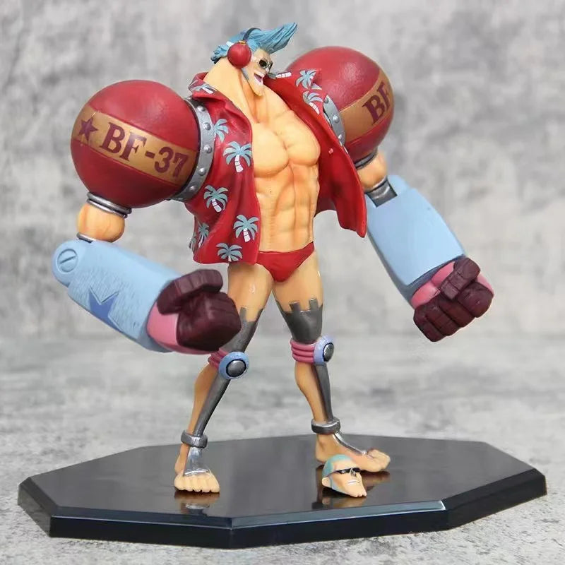 18cm Figurine One Piece | Figurine de collection représentant Franky en mode combat. Ce modèle détaillé avec deux têtes interchangeables est idéal pour décorer et parfait pour un cadeau de Noël pour les fans de One Piece !