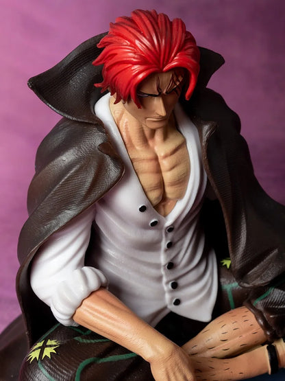 17cm Figurine One Piece | Figurine représentant Shanks le Roux, le célèbre Yonko. Parfaite pour les fans et collectionneurs, cette figurine est idéale pour décorer et enrichir toute collection d’anime