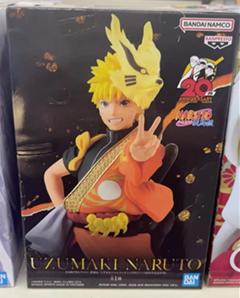 16cm Figurine Bandai Banpresto (édition limitée Naruto 20th Anniversary Clothing) | Figurines représentant Uchiha Sasuke et Uzumaki Naruto, célébrant le 20e anniversaire de Naruto Shippûden. Modèles détaillés, parfaits pour les fans et les collectionneurs