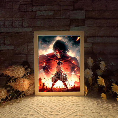 Cadre Lumineux LED Attack on Titan | Illuminez votre espace avec ce cadre photo mettant en scène les personnages emblématiques Levi et Mikasa. Ce cadre lumineux est parfait pour une ambiance unique et constitue un excellent cadeau