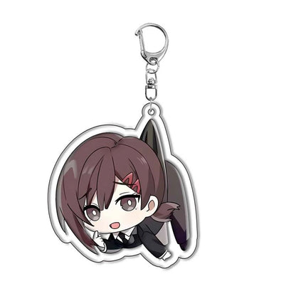 Pendentif représentant des personnages de l'anime Chainsaw Man, idéal pour décorer sacs et clés. Parfait comme cadeau de cosplay ou pour les fans. Un accessoire pratique et stylé à offrir ou à collectionner