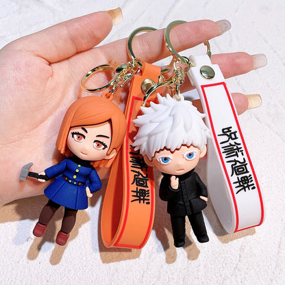 Porte-clés kawaii inspiré de Jujutsu Kaisen représentant Gojo, Yuji, Megumi, Nobara. Parfait pour accrocher à votre sac ou comme porte-clés décoratif