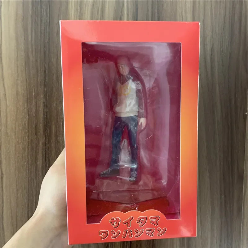 Figura One Punch Man de 18 cm | Figura de PVC de Saitama con una sudadera con capucha oppai, que captura un momento casual del héroe. Ideal para coleccionistas y fans de One Punch Man, así como como decoración o regalo.