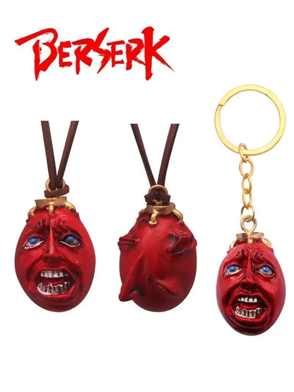 Pendentif et porte-clés représentant le Behelit, œuf du Roi de Berserk. Ces bijoux sont parfaits pour les fans de l'anime et du manga, idéals pour ajouter une touche de style gothique à vos accessoires quotidiens