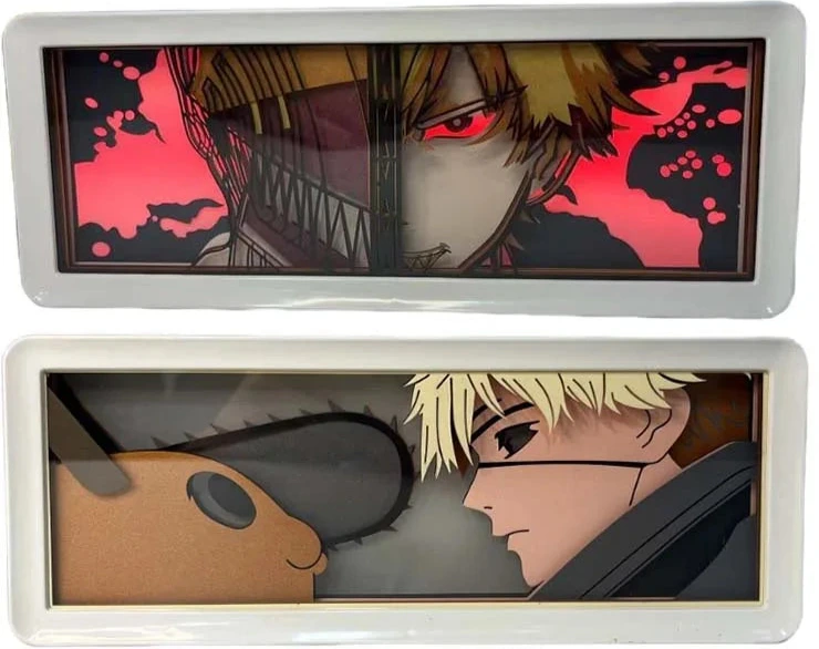 Lampe Décorative Chainsaw Man | Boîte lumineuse avec design en papier découpé représentant le visage de Denji et Pochita. Parfaite pour décorer une chambre ou un bureau, cette lampe offre une ambiance unique pour les fans de manga et d'anime